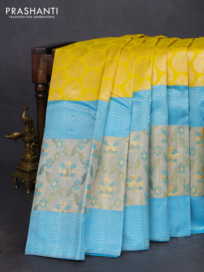 Pure kanchipuram silk saree yellow and teal blue with silver zari woven buttas and long rich zari woven border