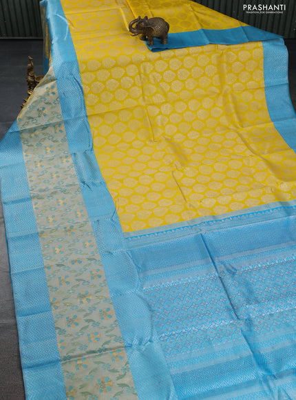 Pure kanchipuram silk saree yellow and teal blue with silver zari woven buttas and long rich zari woven border
