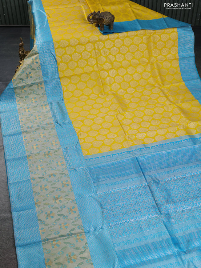 Pure kanchipuram silk saree yellow and teal blue with silver zari woven buttas and long rich zari woven border
