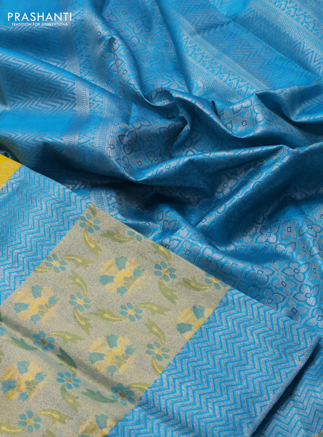 Pure kanchipuram silk saree yellow and teal blue with silver zari woven buttas and long rich zari woven border
