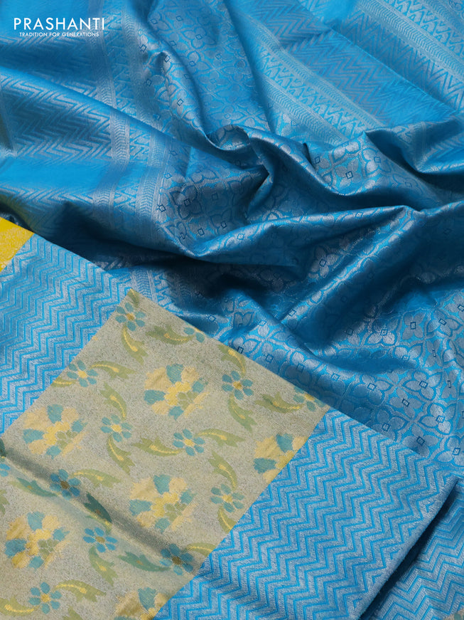 Pure kanchipuram silk saree yellow and teal blue with silver zari woven buttas and long rich zari woven border