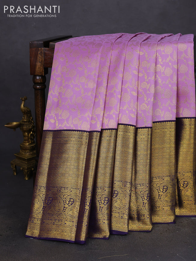 Pure kanchipuram silk saree lavender and navy blue with allover zari woven brocade weaves and zari woven border
