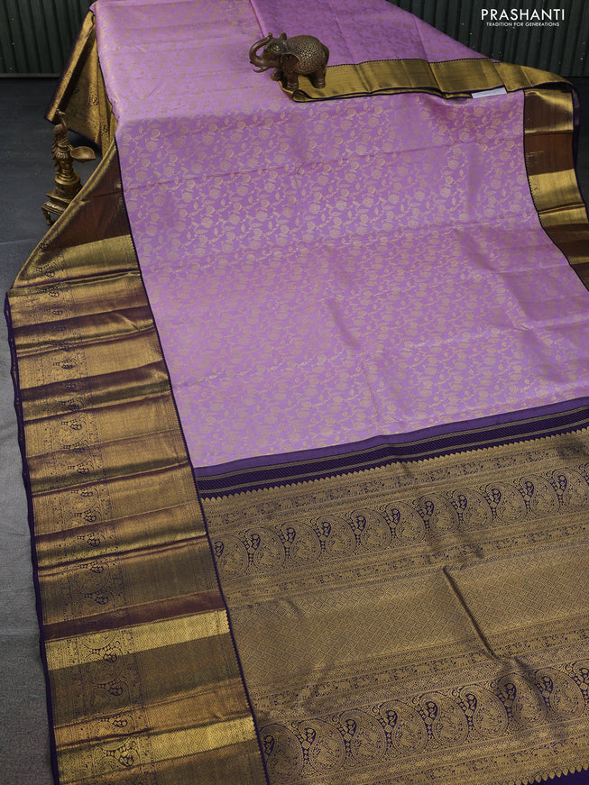 Pure kanchipuram silk saree lavender and navy blue with allover zari woven brocade weaves and zari woven border