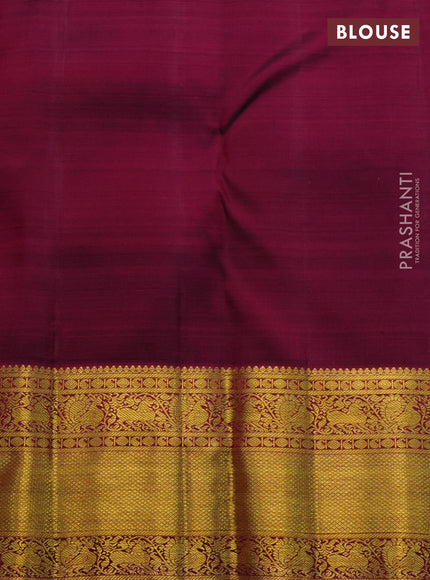 Pure kanchipuram silk saree pastel green and dark magenta pink with allover zari woven brocade weaves and zari woven border