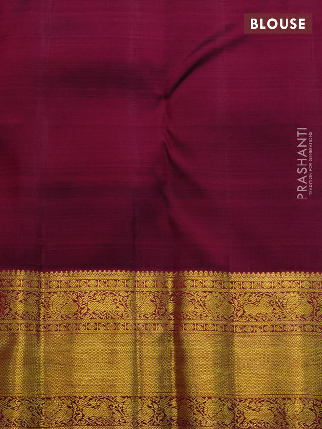 Pure kanchipuram silk saree pastel green and dark magenta pink with allover zari woven brocade weaves and zari woven border