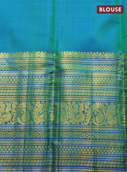 Pure kanchipuram silk saree yellow and blue with allover silver zari woven brocade weaves and long zari woven border
