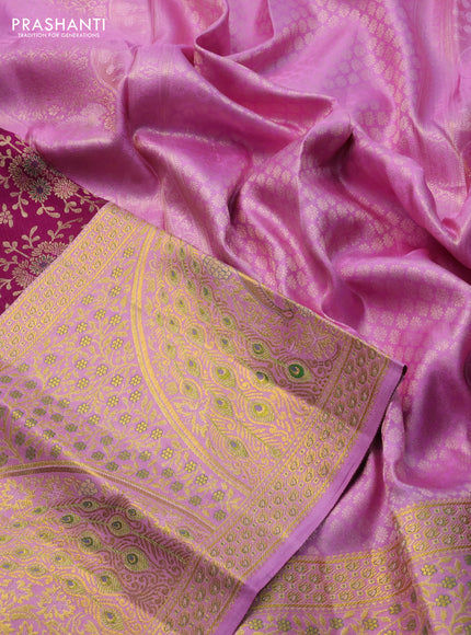 Pure kanchipuram silk saree deep purple and lotus pink with allover zari woven brocade weaves and long rich zari woven border