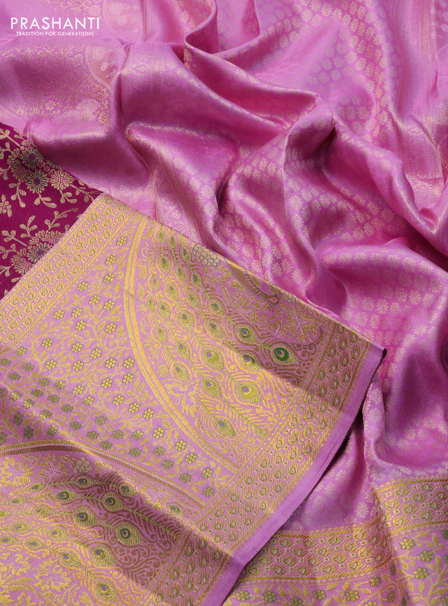 Pure kanchipuram silk saree deep purple and lotus pink with allover zari woven brocade weaves and long rich zari woven border