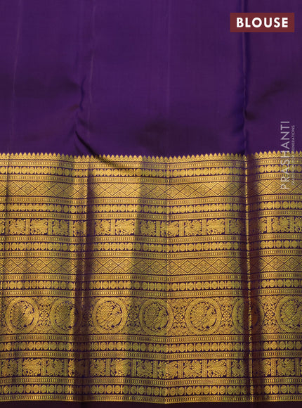 Pure kanchipuram silk saree teal blue and deep jamun with allover zari woven brocade weaves and long zari woven border