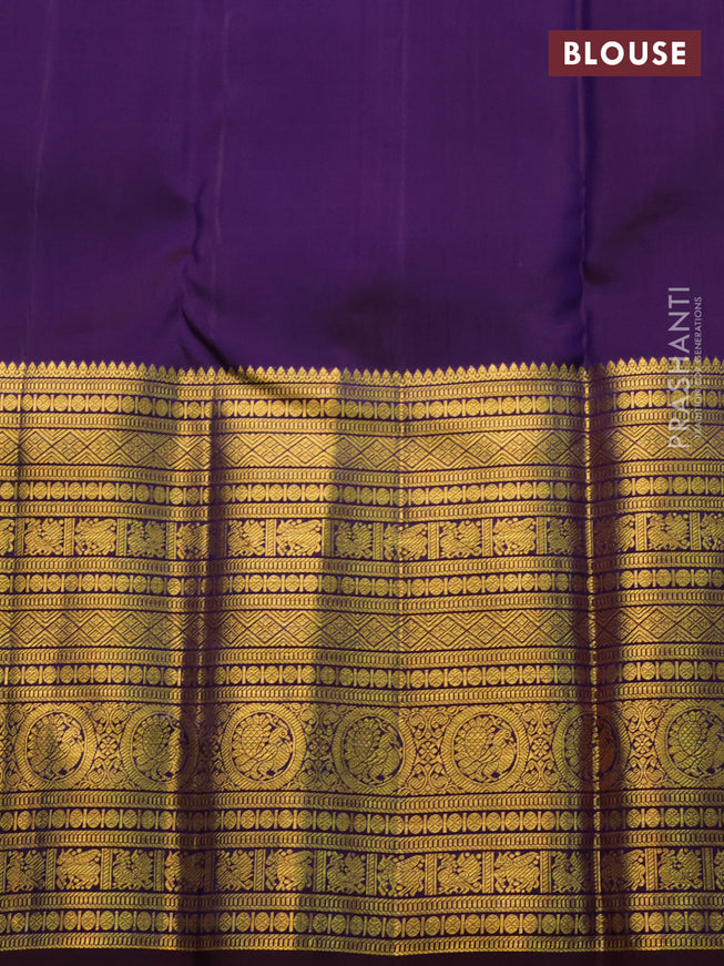 Pure kanchipuram silk saree teal blue and deep jamun with allover zari woven brocade weaves and long zari woven border