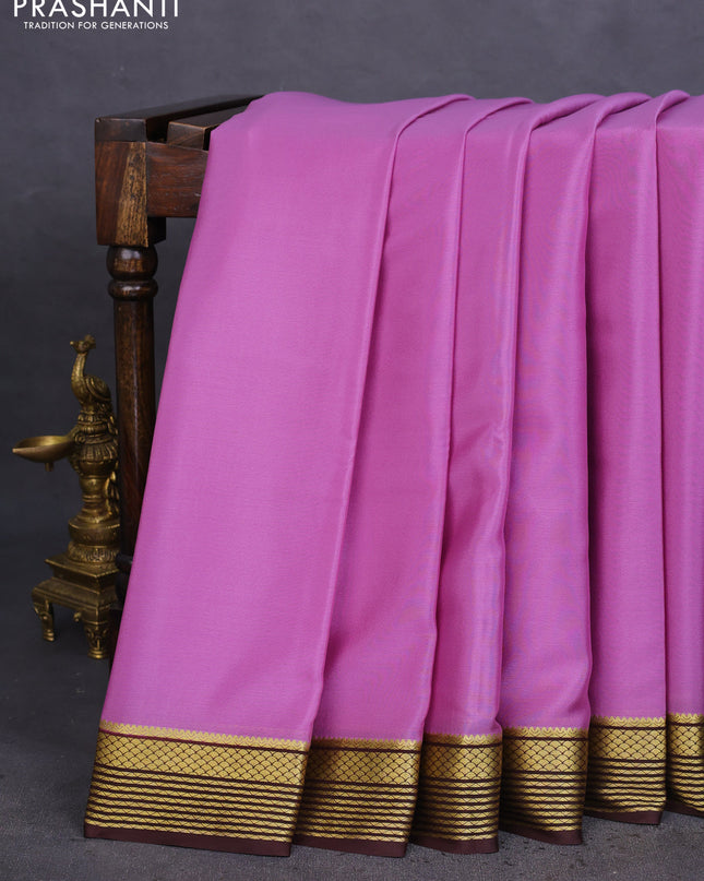 Pure mysore silk saree mild purple and coffee brown with plain body and zari woven border