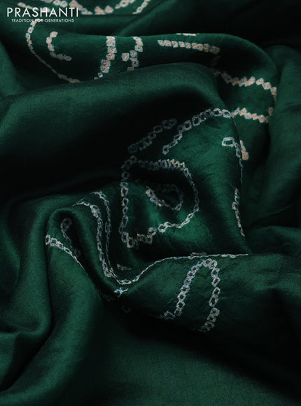 Chiniya silk saree green with allover bandhani prints