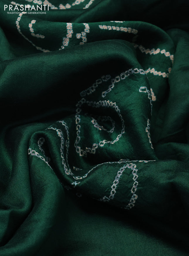 Chiniya silk saree green with allover bandhani prints