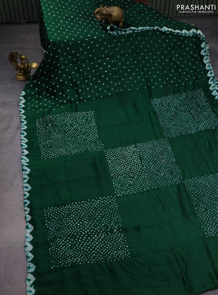 Chiniya silk saree green with allover bandhani prints