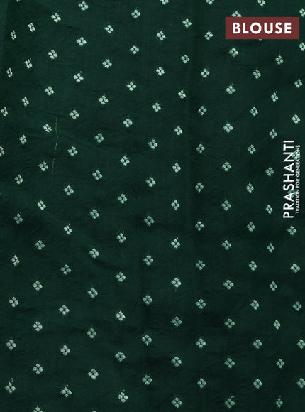 Chiniya silk saree green with allover bandhani prints