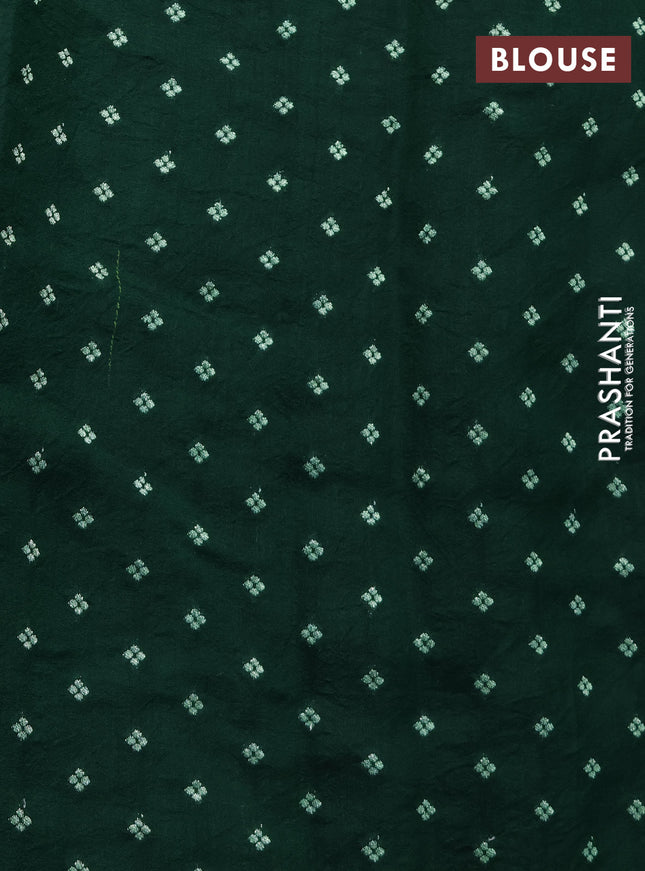 Chiniya silk saree green with allover bandhani prints