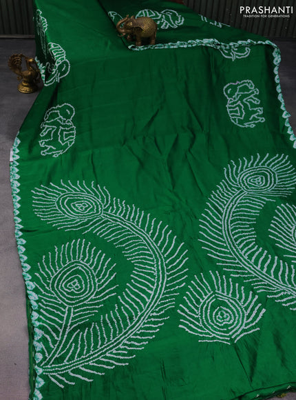 Chiniya silk saree green with allover bandhani prints
