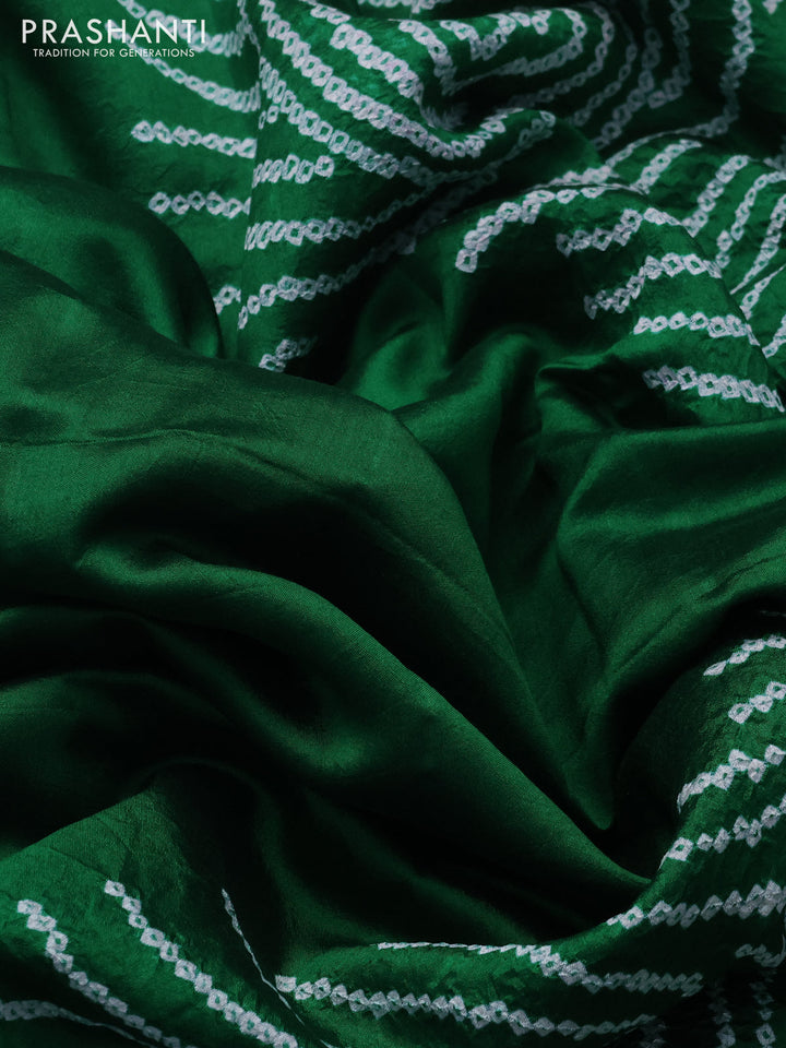 Chiniya silk saree green with allover bandhani prints