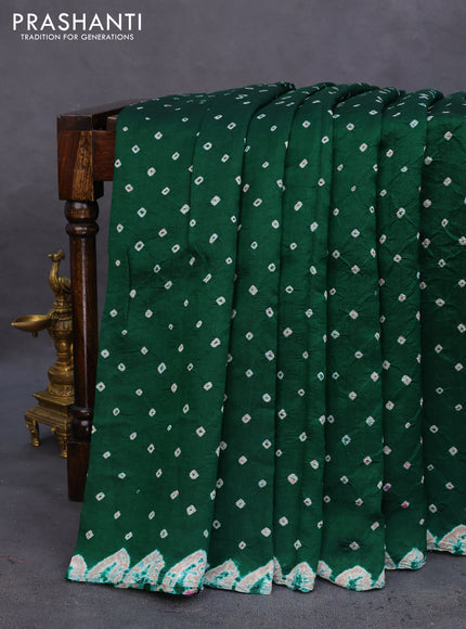 Chiniya silk saree green with allover bandhani prints
