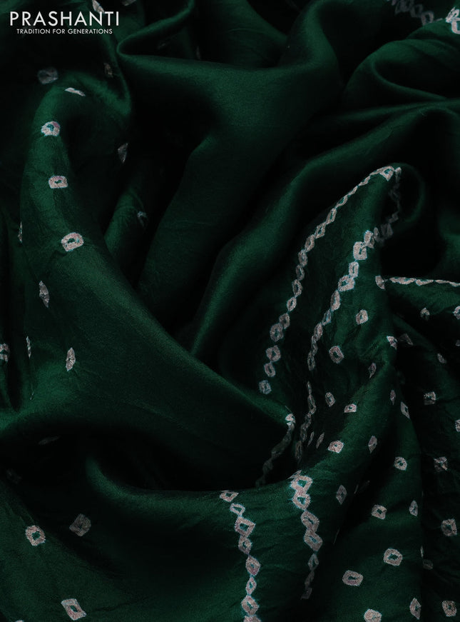 Chiniya silk saree green with allover bandhani prints