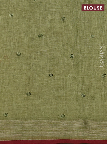 linen cotton saree light green and red with embroidery buttas and zari woven border