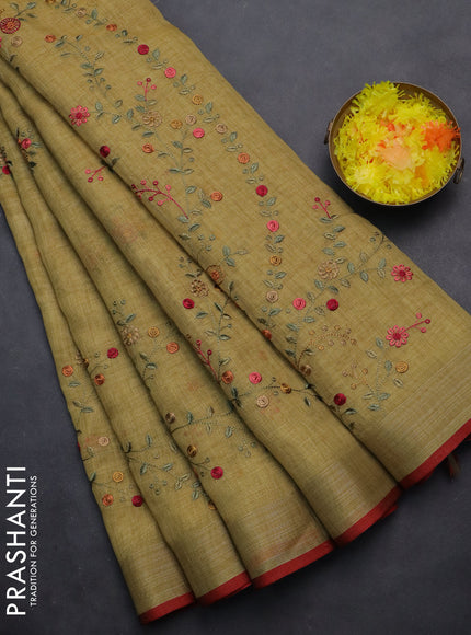 linen cotton saree mustard yellow and red with embroidery buttas and zari woven border