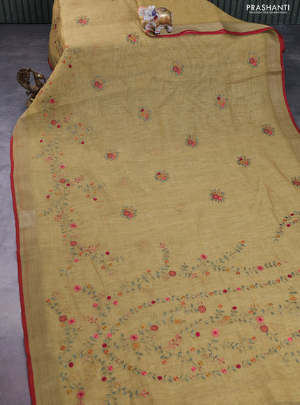 linen cotton saree mustard yellow and red with embroidery buttas and zari woven border