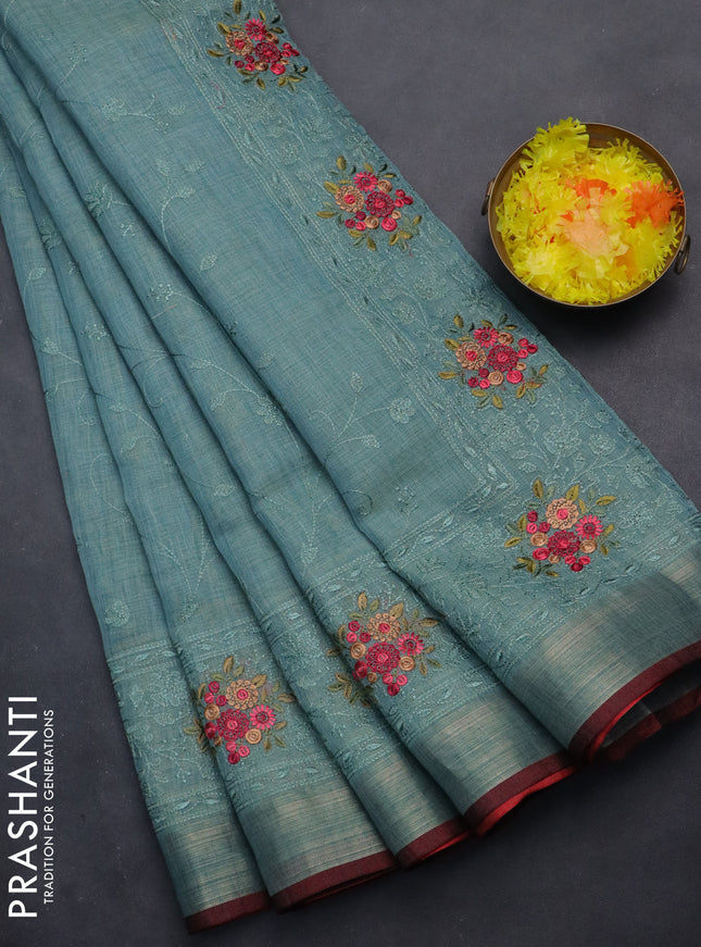 linen cotton saree pastel blue and maroon with allover embroidery work and zari woven border