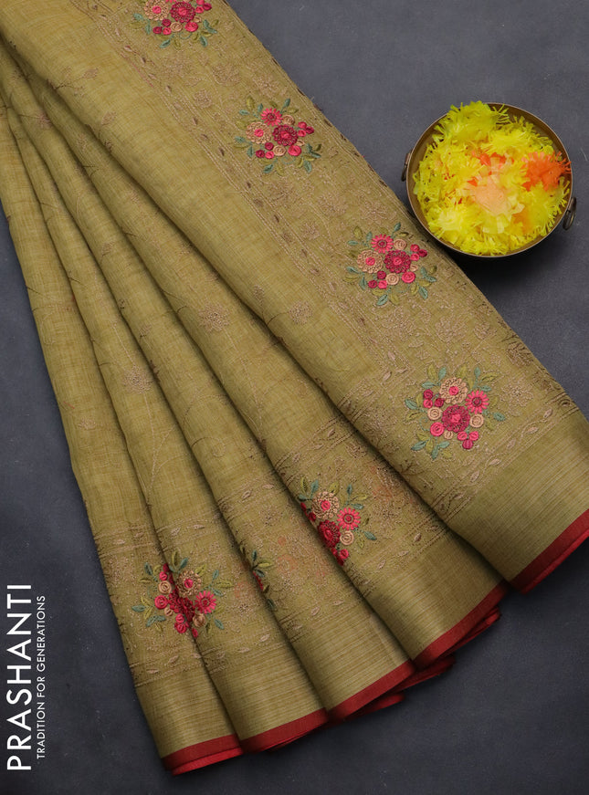 linen cotton saree mustrad green and maroon with allover embroidery work and zari woven border