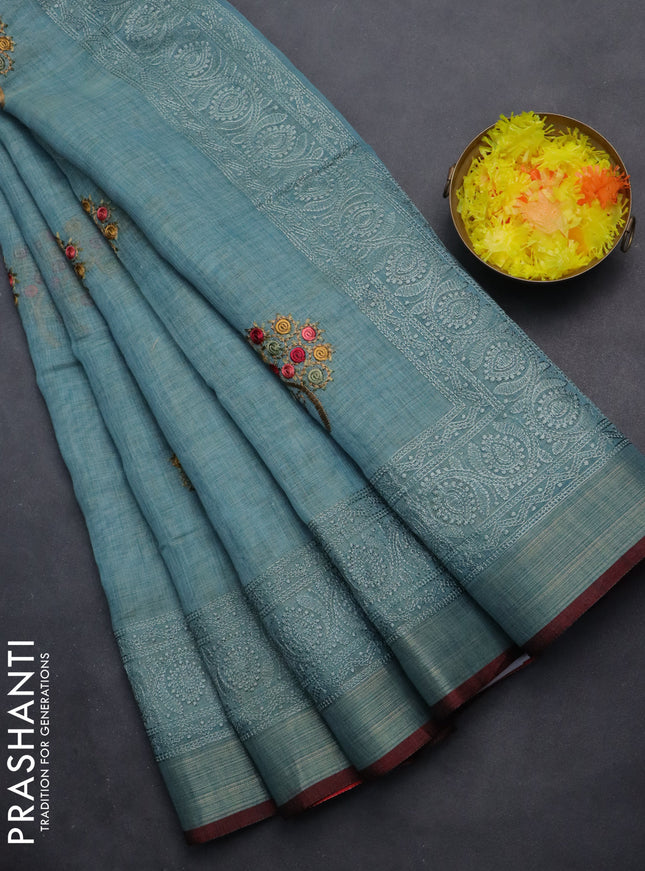 linen cotton saree pastel blue and red with embroidery buttas and zari woven border