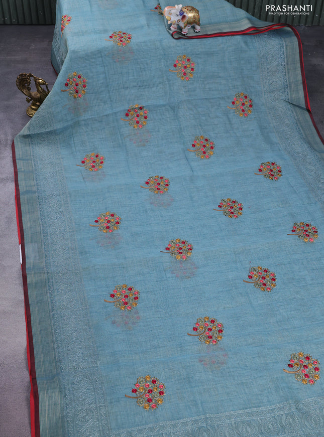 linen cotton saree pastel blue and red with embroidery buttas and zari woven border