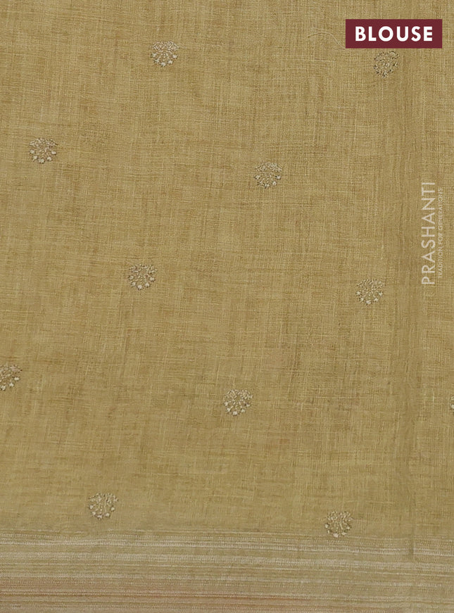 linen cotton saree mustrad green and red with allover embroidery work and zari woven border