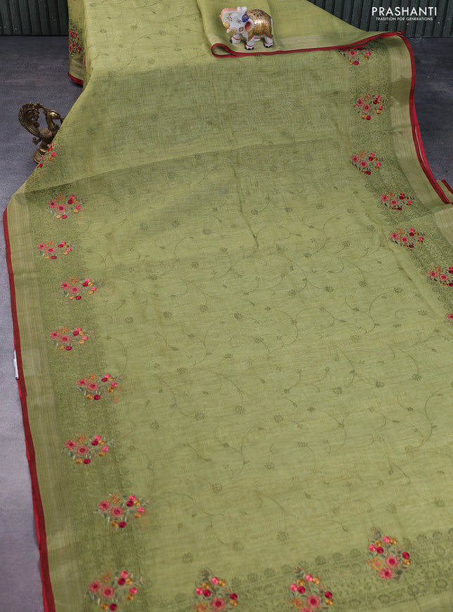 linen cotton saree light green and maroon with allover embroidery work and zari woven border