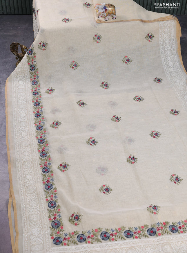 linen cotton saree cream and grey with floral embroidery buttas and embroidery border