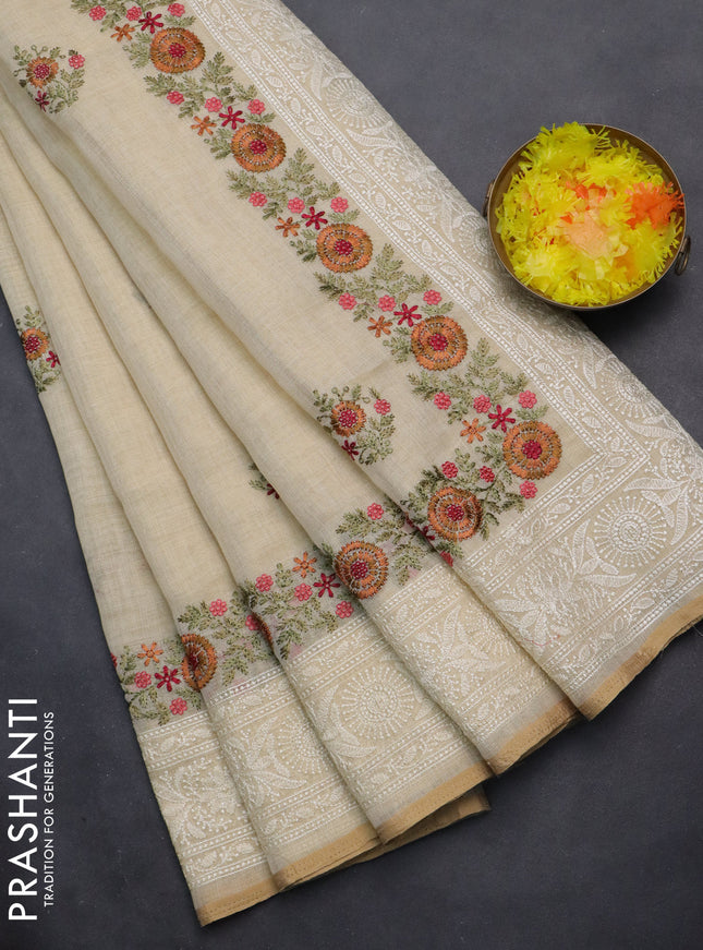 linen cotton saree cream and rust shade with floral embroidery buttas and embroidery border