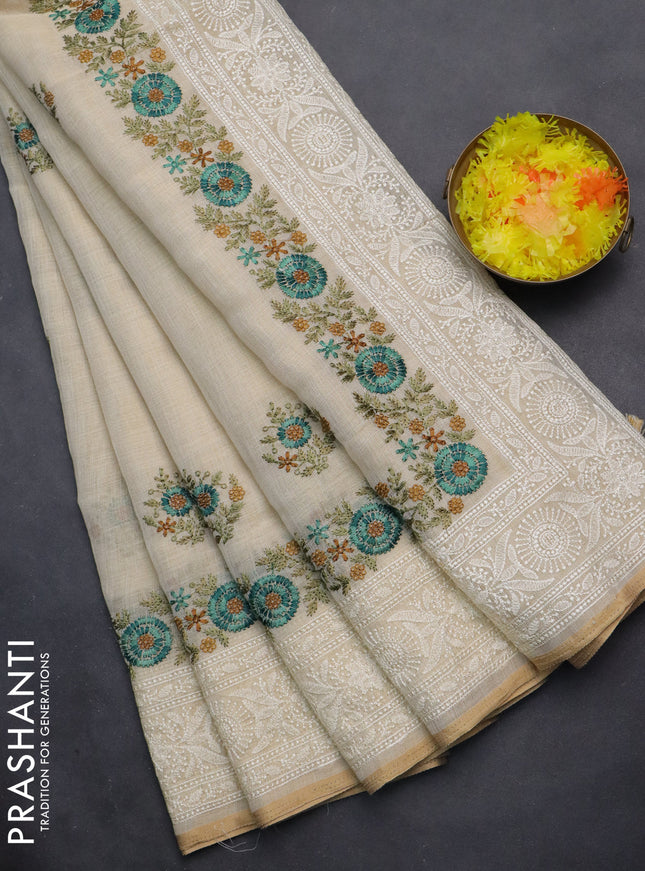linen cotton saree cream and teal green with floral embroidery buttas and embroidery border