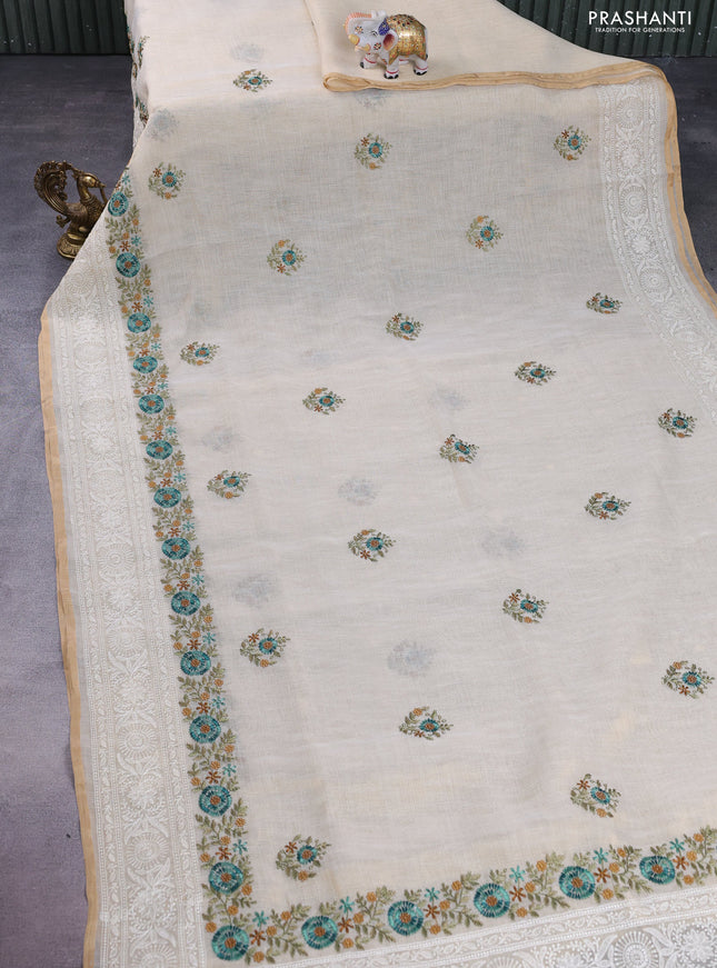 linen cotton saree cream and teal green with floral embroidery buttas and embroidery border