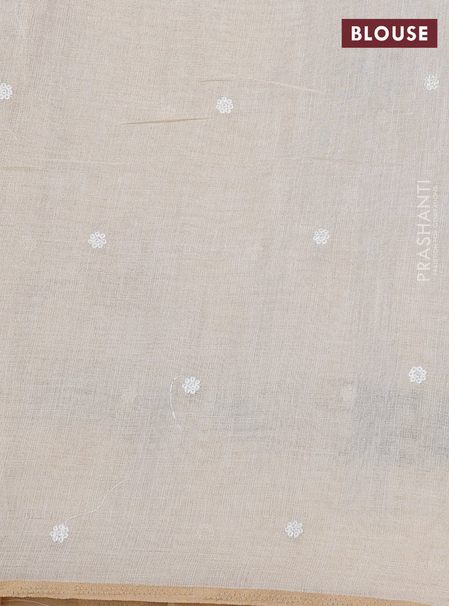 linen cotton saree cream and teal green with floral embroidery buttas and embroidery border