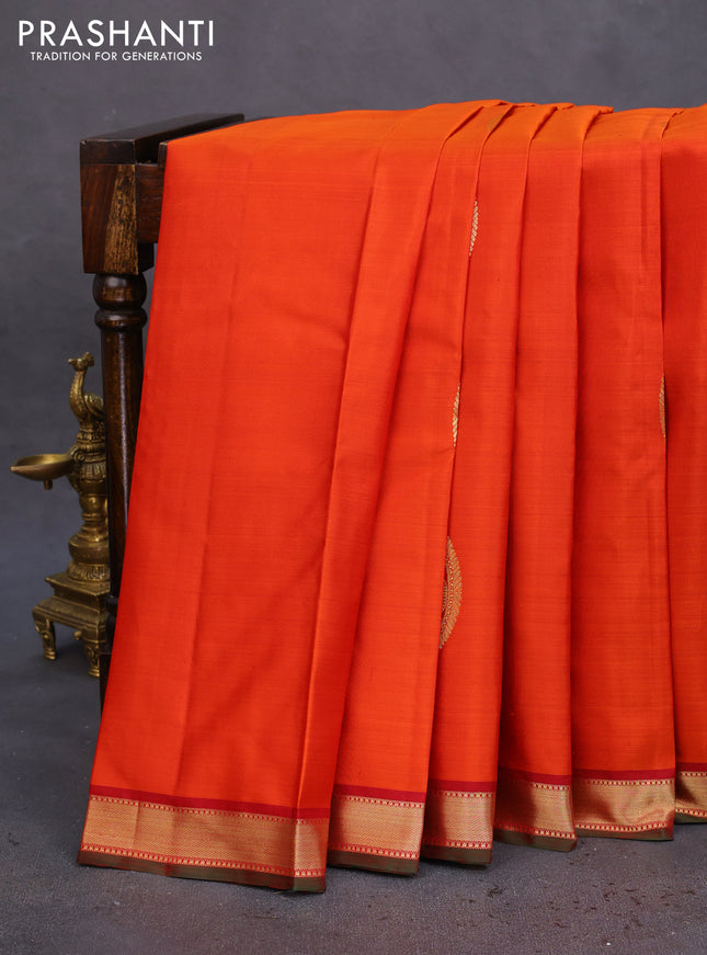 Pure kanchipuram silk saree orange and green with zari woven buttas and zari woven border