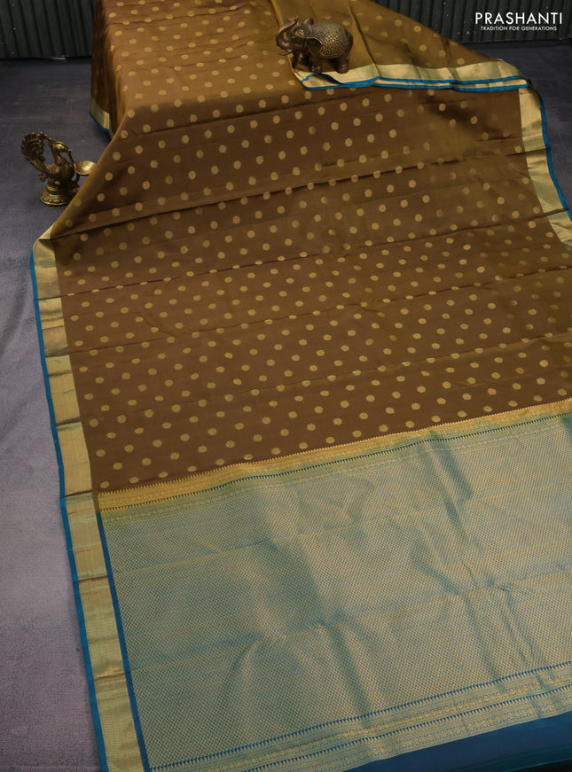 Pure kanchipuram silk saree mehendi green and peacock green with zari woven buttas and zari woven border