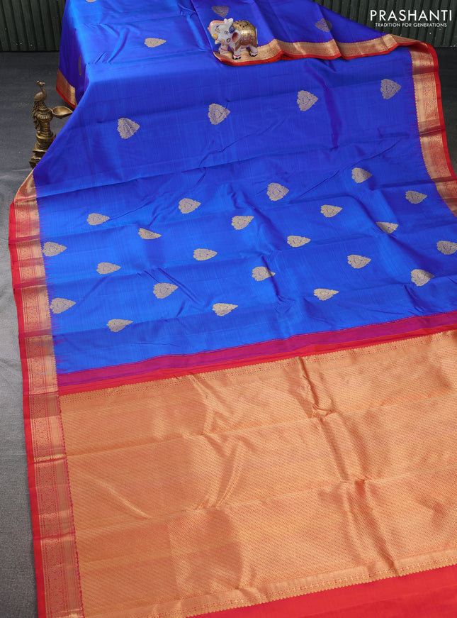 Pure kanchipuram silk saree blue and dual shade of pinkish orange with allover vairosi pattern & zari buttas and zari woven border