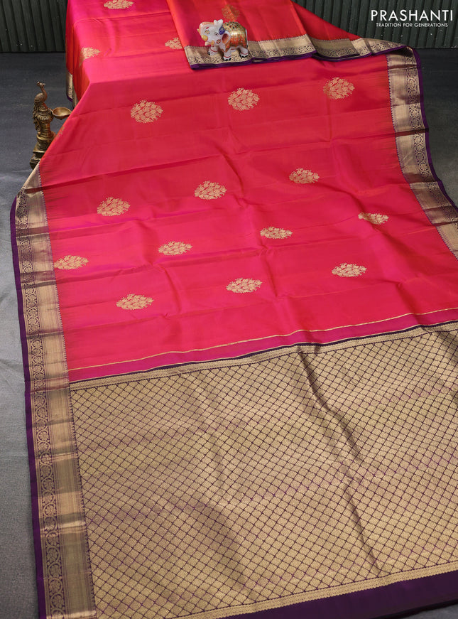 Pure kanchipuram silk saree dual shade of pinkish orange and deep purple with allover vairosi pattern & zari buttas and zari woven border