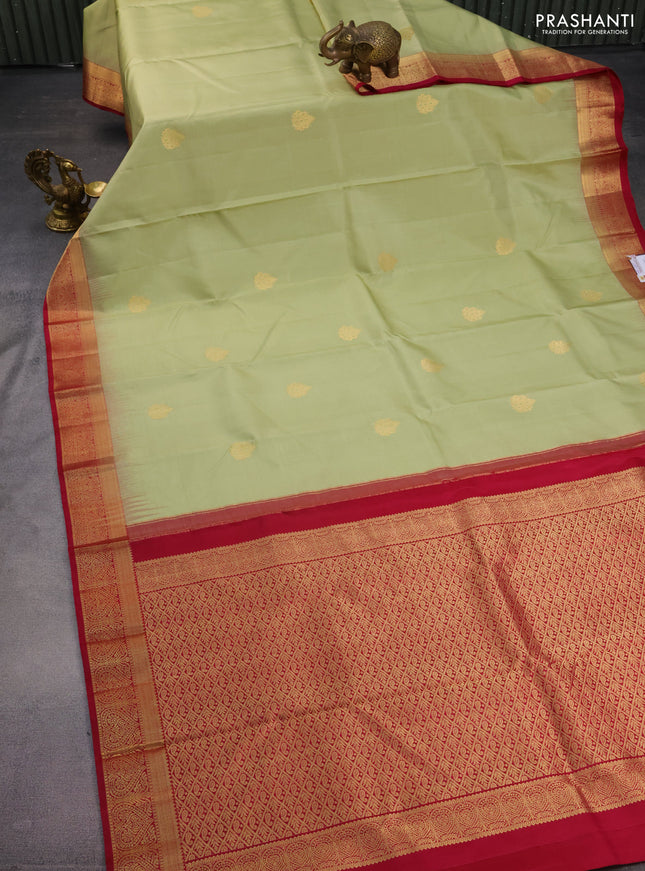 Pure kanchipuram silk saree pista green and magenta pink with allover vairosi pattern & zari buttas and zari woven border