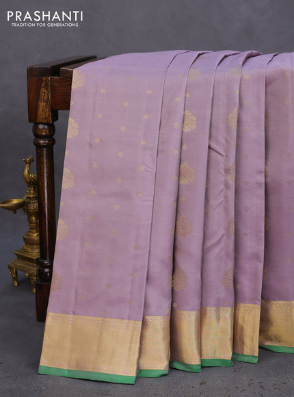 Pure kanchipuram silk saree pastel grey and green with zari woven buttas and zari woven border
