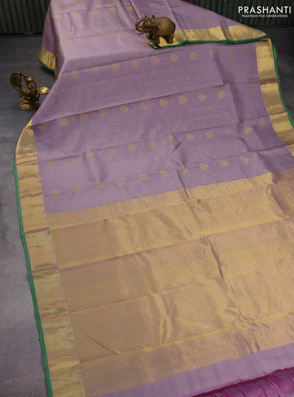 Pure kanchipuram silk saree pastel grey and green with zari woven buttas and zari woven border