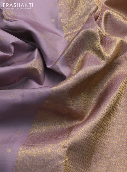 Pure kanchipuram silk saree pastel grey and green with zari woven buttas and zari woven border