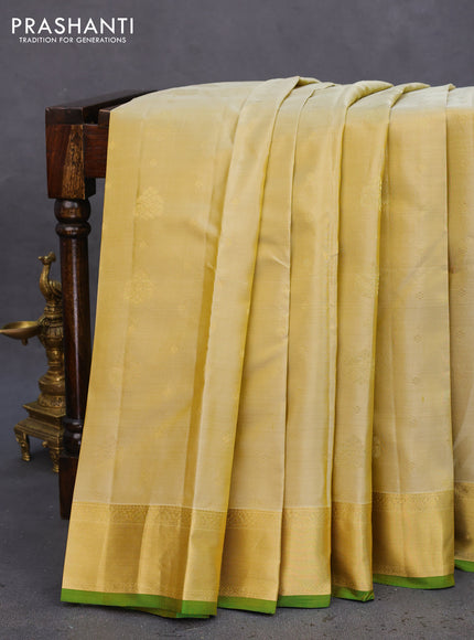 Pure kanchipuram silk saree pale yellow and green with zari woven buttas and zari woven border