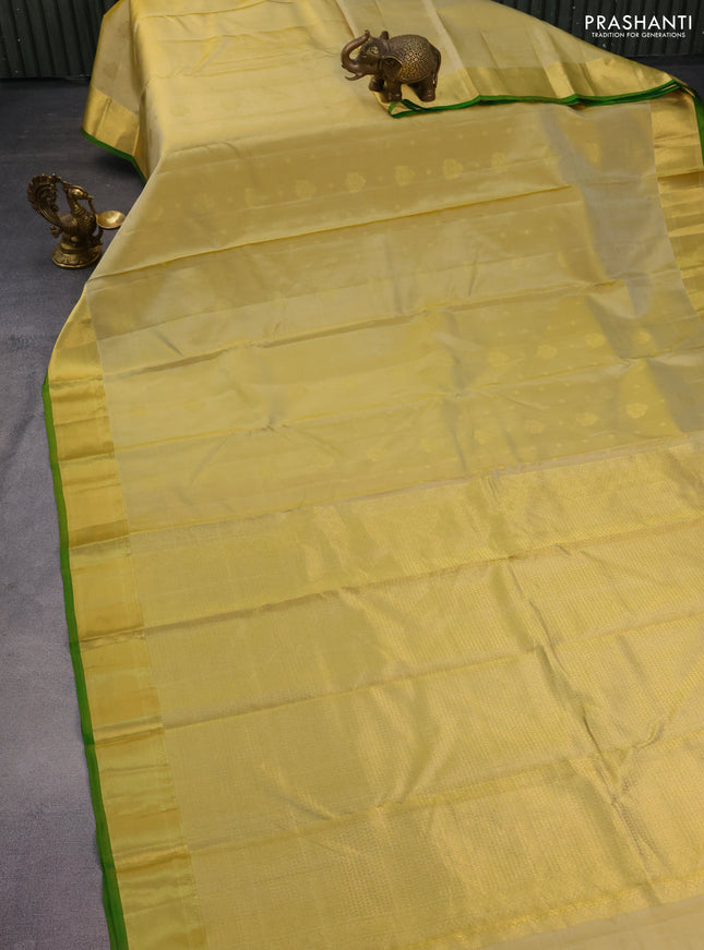 Pure kanchipuram silk saree pale yellow and green with zari woven buttas and zari woven border