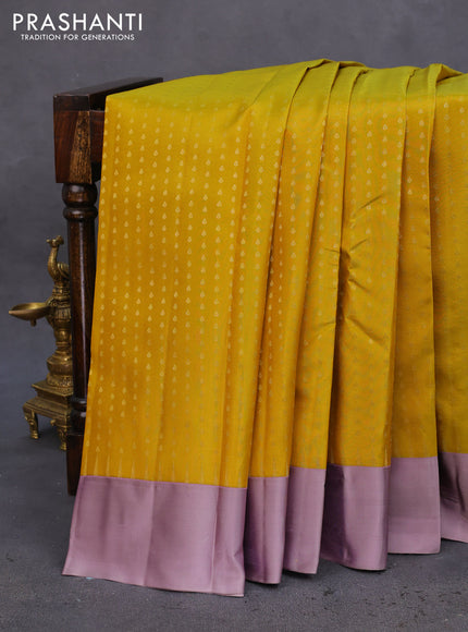 Pure kanchipuram silk saree mustard yellow and grey shade with allover zari woven 1000 buttas and temple design simple korvai border