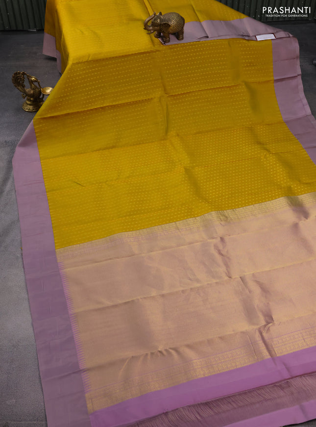 Pure kanchipuram silk saree mustard yellow and grey shade with allover zari woven 1000 buttas and temple design simple korvai border